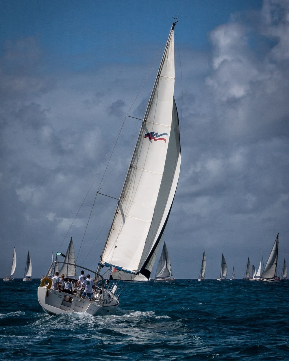 Sailboat heeling in afternoon wind