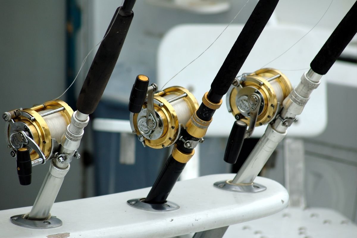 Offshore fishing rods over blue water