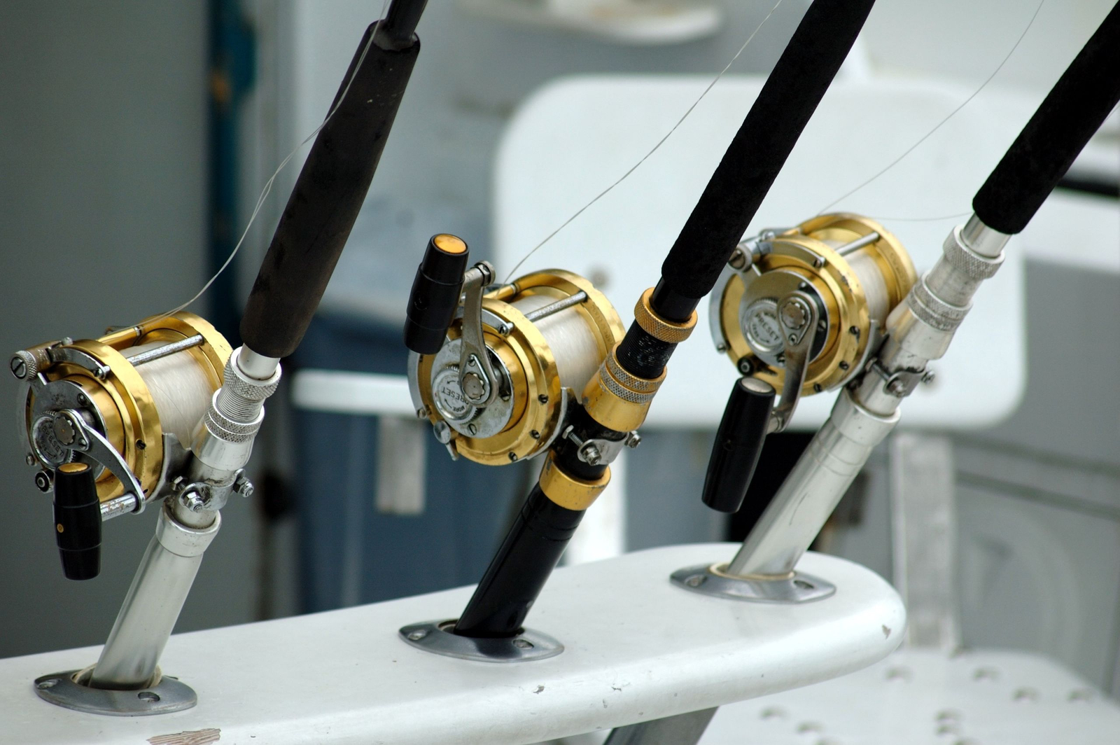 Offshore fishing rods over blue water