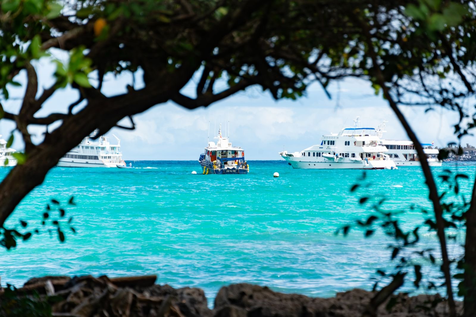 Boats anchored in a turquoise Mexican bay