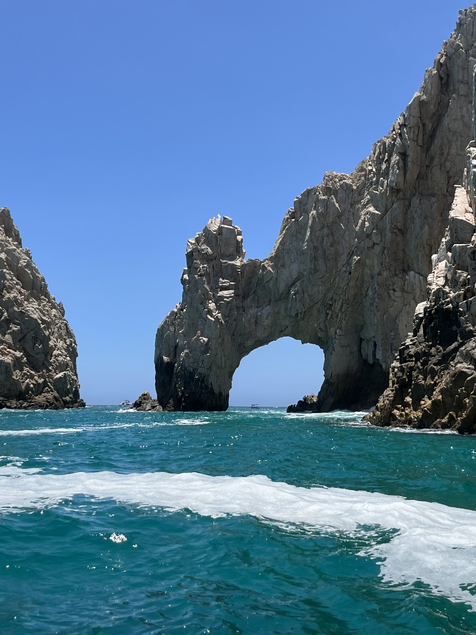 The Arch of Los Cabos framed by turquoise sea and clear blue sky