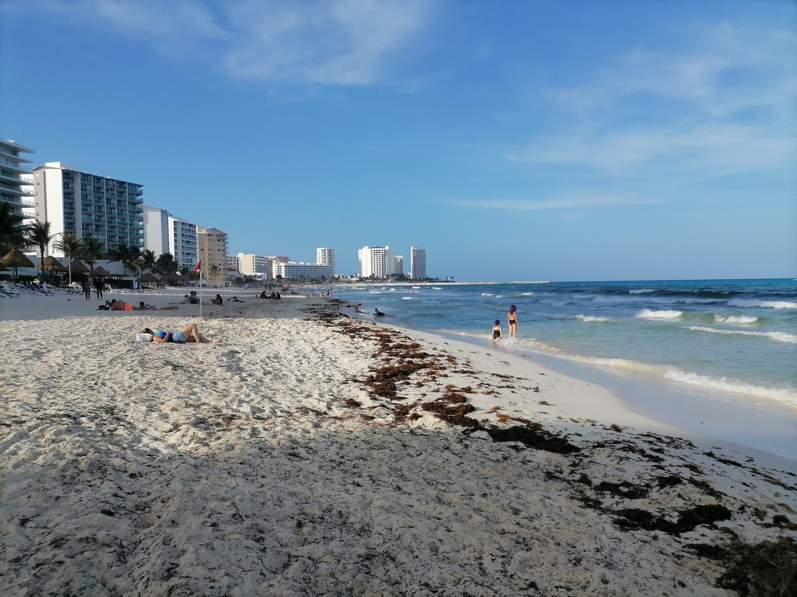 The wide open beach and Caribbean water at Playa Delfines in the Cancun hotel zone