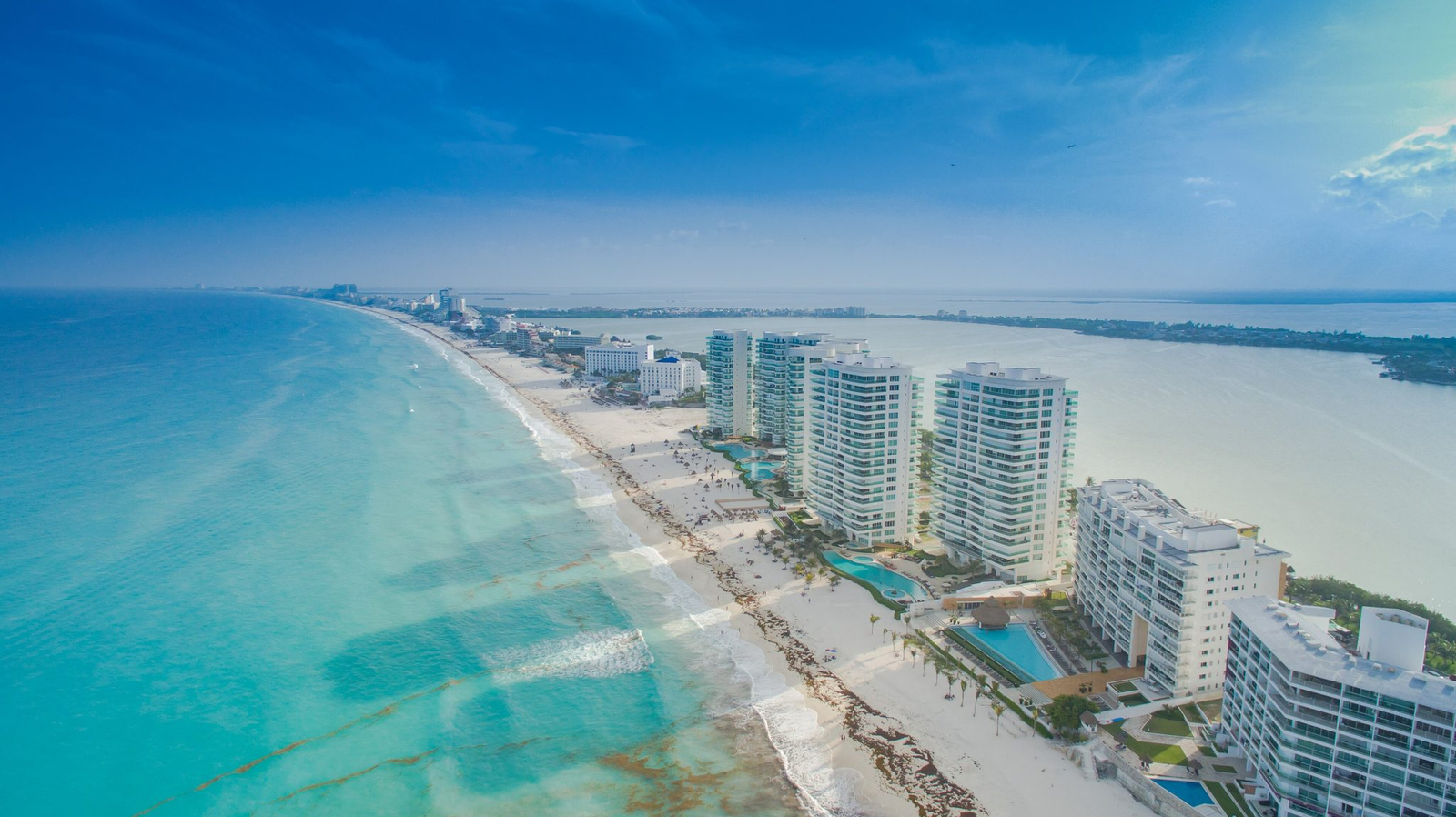 Aerial view of the Cancun hotel zone, with the Caribbean on one side and the Nichupte lagoon on the other